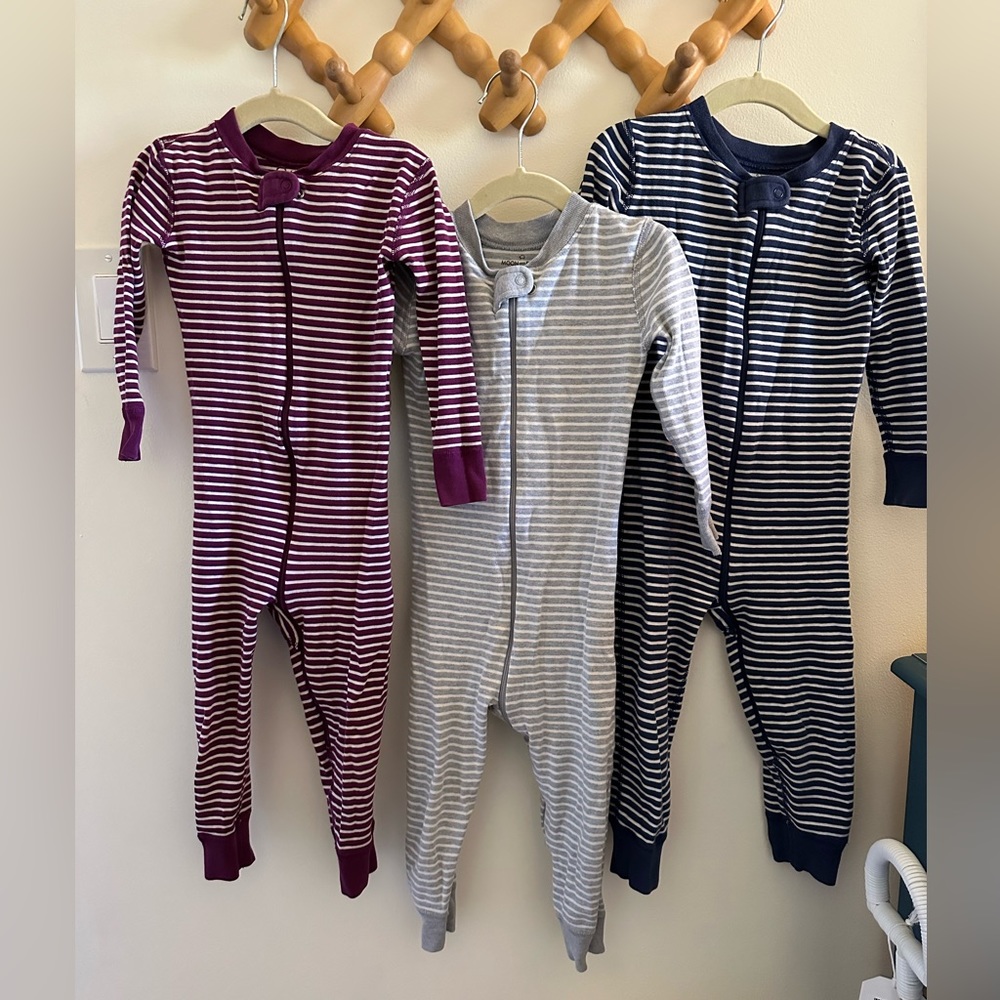 Bundle of three zip up pajamas in good condition